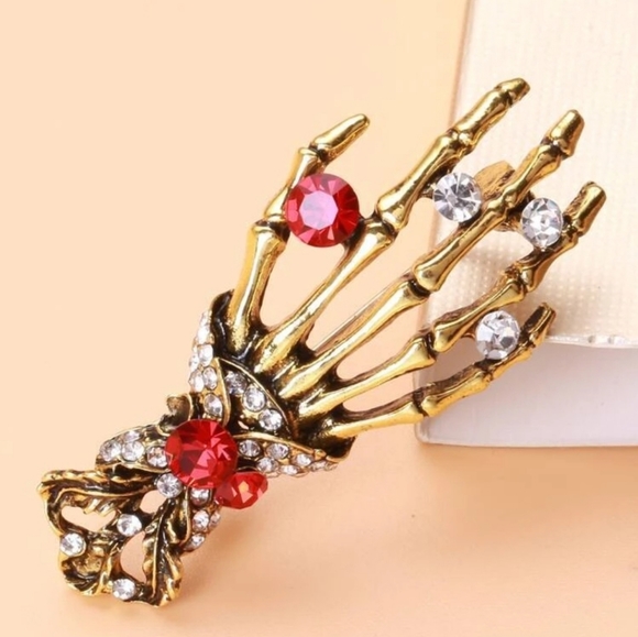 Gold plated red and white crystal skeleton hand necklace/brooch - Picture 9 of 11